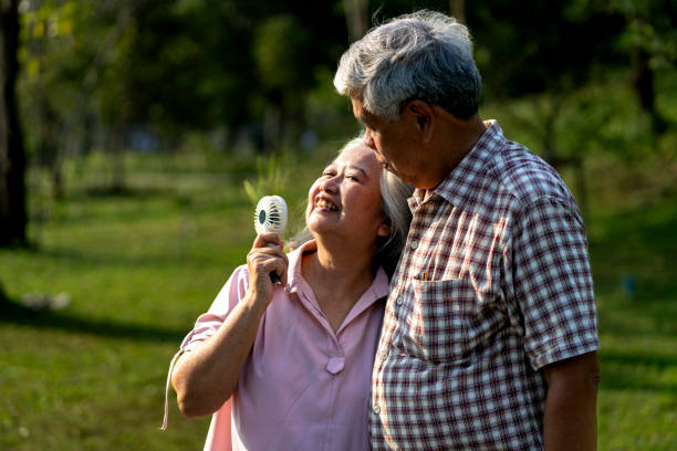 Senior couple enjoying a moment in park