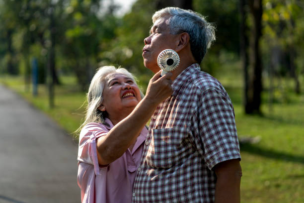 istock Senior couple enjoying a moment in park 2201899340
