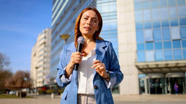 istock Journalist is delivering a live report from downtown 2201900401
