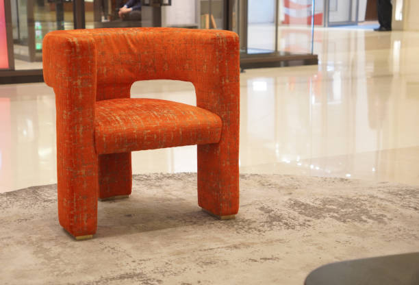 istock red armchair on wood floor 2201901242