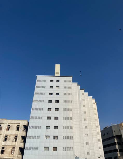 istock The incredible view of the blue sky with white building 2201902549