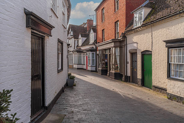 istock old cottages high street ancestor england uk 2201903352
