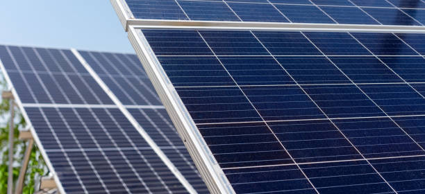 istock Diagonal view close up solar panels of solar power station with selective focus 2201908990