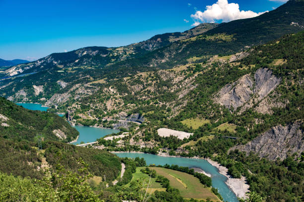 Lake of Serre-Poncon (Alpes-de-Haute-Provence, Provence-Alpes-Cote-d'Azur, France): mountain landscape in the French Alps at June