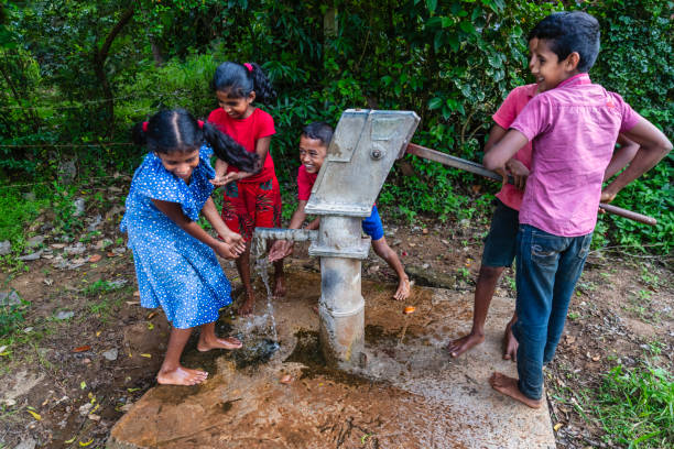 istock Sri Lankan children drinking a water, Ceylon 2201915165