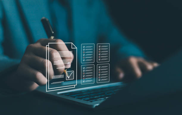 istock Business Performance Checklist Businessman Using Laptop Doing Online Checklist 2201915187