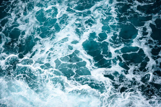 istock Texture of azure bubbling Mediterranean Sea water 2201919542