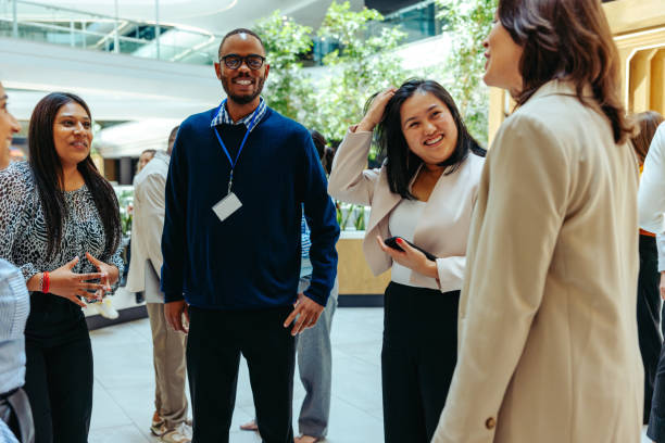 istock Casual business meeting in a modern office courtyard 2201920455
