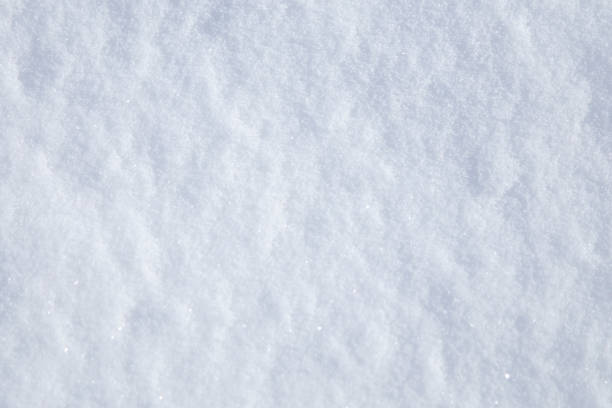 istock background of snow-white fluffy snow 2201920578