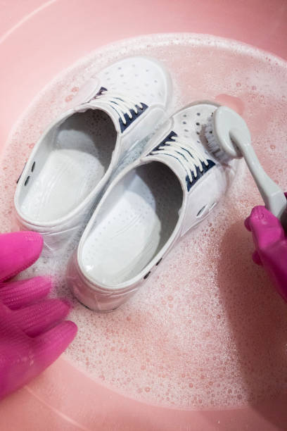 istock Clean dirty indoor shoes thoroughly 2201921866