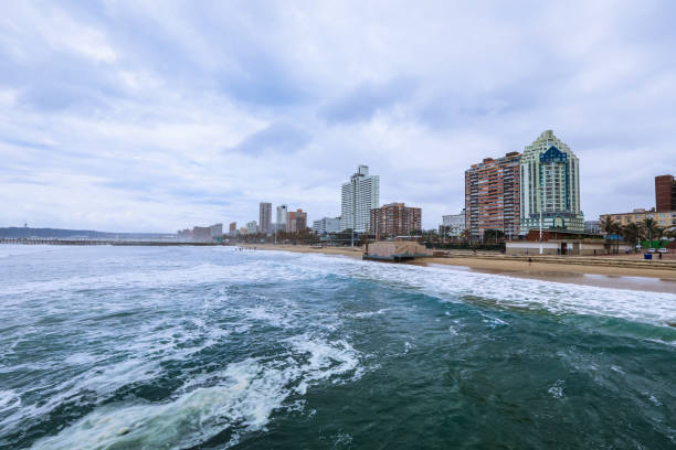 istock View of Durban beachfront and skyline under cloudy sky with gentle waves rolling ashore 2201921944
