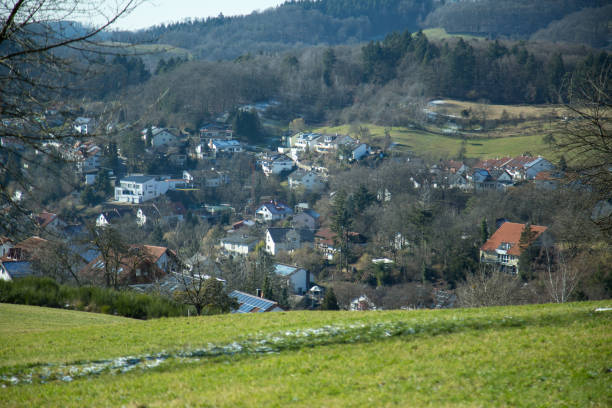 istock Scenic Village and Hills Under a Clear Blue Sky 2201927655