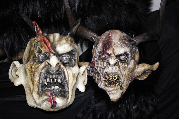 Krampus (devil) mask at traditional procession on December in Zell am See, Austria