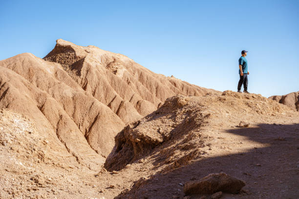 istock men standing in Atacama desert in Chile 2201932094