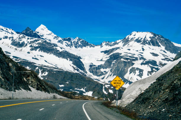 Alaskan mountain pass road with glacier views