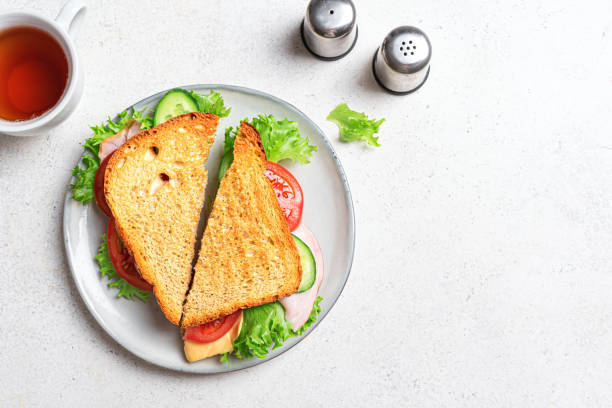 istock Fresh club sandwich cut in half 2201933363