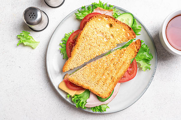 istock Fresh club sandwich cut in half 2201933468
