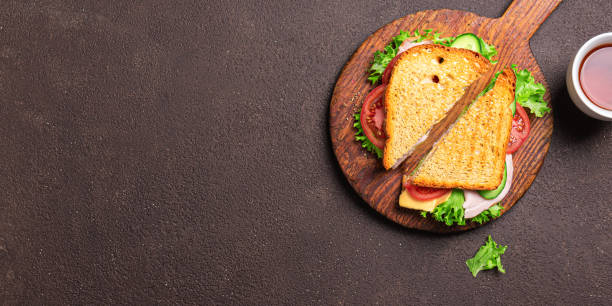 istock Fresh club sandwich cut in half 2201933541
