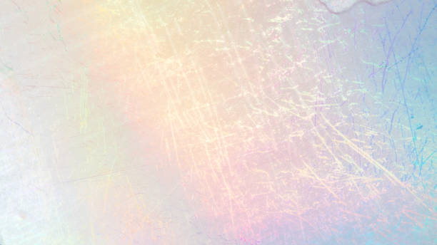 istock Scratched foil texture with iridescent hues creating a subtle, colorful background 2201935143