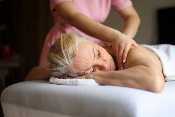 istock Senior woman in a spa 2201935861