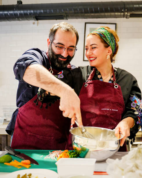 istock Happy Couple Enjoying a Cooking Class Together 2201937244