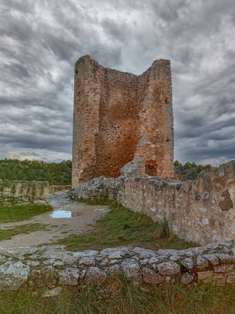 istock Ancient stone ruins of the Castle of Calataazor under a dramatic sky 2201939119