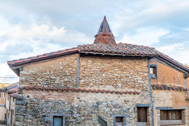 istock Rustic stone house with a unique fireplace in a village in Soria, Spain. 2201939147
