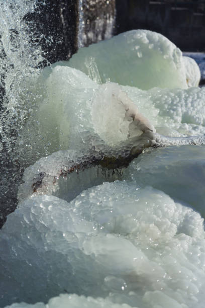 istock Frozen waterfall. Huge chunks of ice. Blocks of ice in the waterfall 2201942901