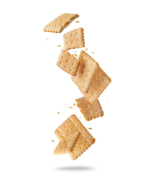istock Levitating whole and crushed crispy cookies in the air close-up on a white background 2201943025