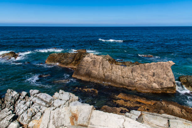 istock View of the rock at the seaside 2201945193