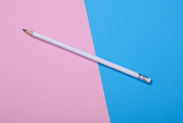 White wooden pencil with eraser on blue pink background. Mockup for design