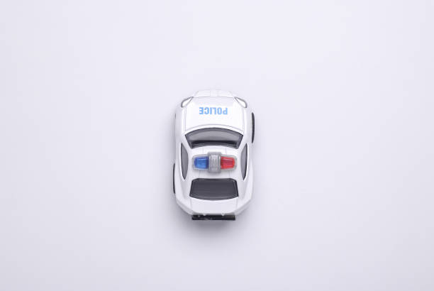 Toy police car for creative projects. Inspires imagination and fun. Perfect for childhood, playtime, and law enforcement themes.
