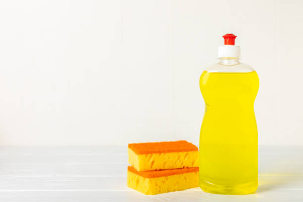 istock Colorful dish sponges on textured background. Kitchen sponge. Cleaning concept, cleaning service. Dishwashing liquid with clean and dirty dishes plate. Place for text, copy space. Wash the dishes. 2201949595
