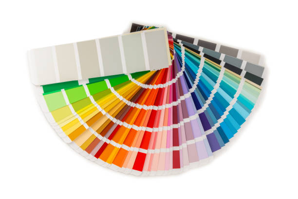 istock Color palette on a bright colored background. Color palette guide. paper catalog of rainbow color. creative.Palette, samples of trending colors. Color swatches. Decor and interior designer. Top view. 2201949672