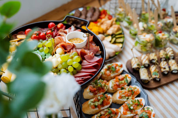 istock The table presents a wide and diverse array of food items, showcasing a delightful yet vibrant mix of flavors, colors, and textures for everyone to enjoy their personal favorites 2201951044