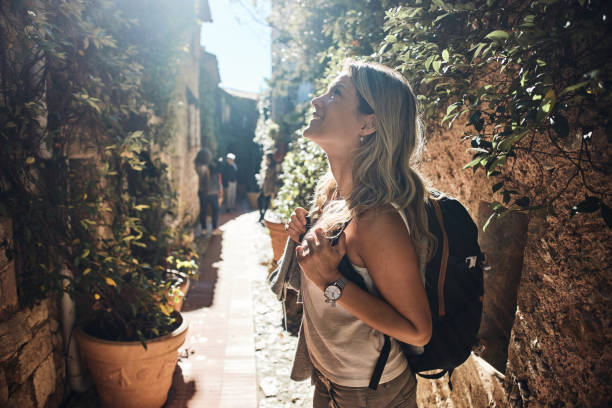 Young female tourist exploring city