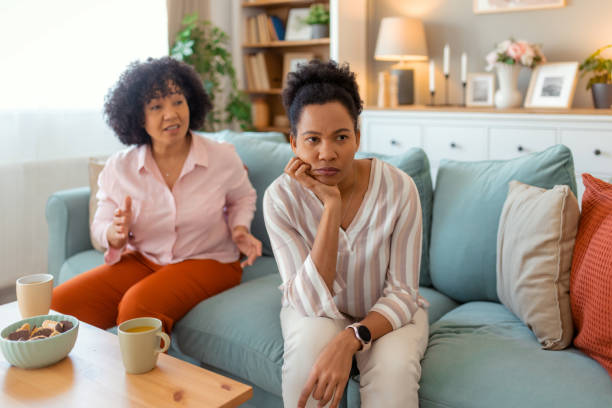 Tense Female Friends Arguing at Home