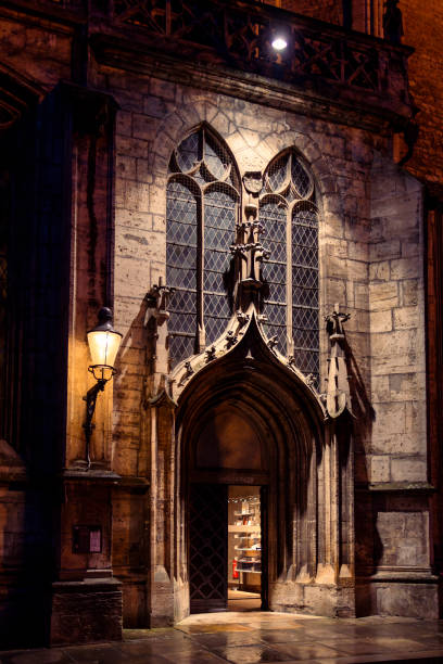 istock Majestic Gothic Cathedral Entrance at Night 2201960634