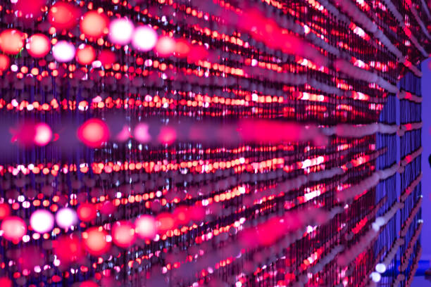 istock Bright red spotlights in an abstract scene vanishing point 2201966769