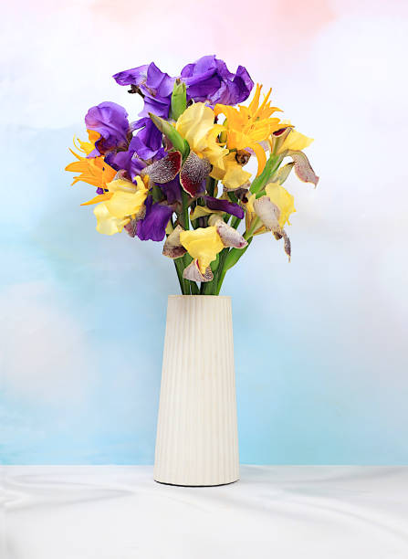 istock Abstract flower arrangement, beautiful siberian irises on elegant background in vase, spring and summer banner. Creative modern bouquet. Mother's day card, happy birthday, wedding, pattern, 2201967606