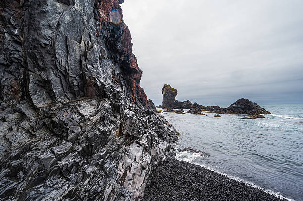 nature sceneries inside Djupalonssandur beach on the Snæfellsnes Peninsula during a rainy day, Iceland