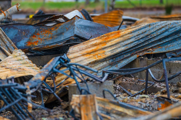 istock pile of twisted rusted metal debris from collapsed structure. 2201969350