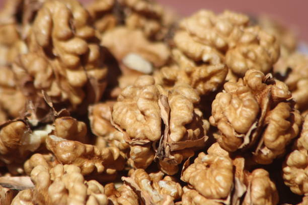 istock A close-up of peeled walnuts 2201969476