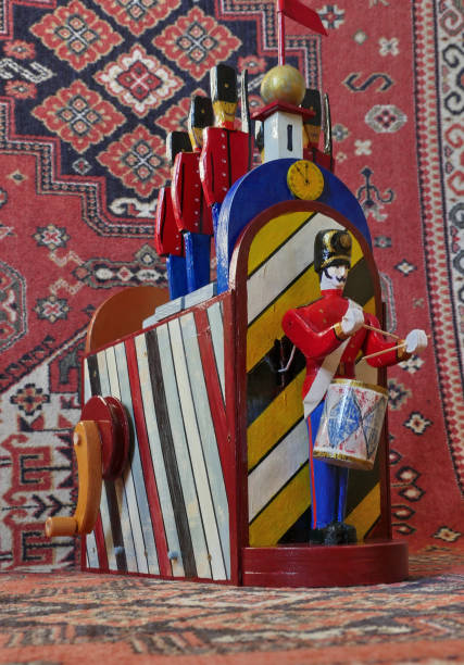 Drummer  and  the Brave Guards, barrel organ and oriental carpet, bazaar
