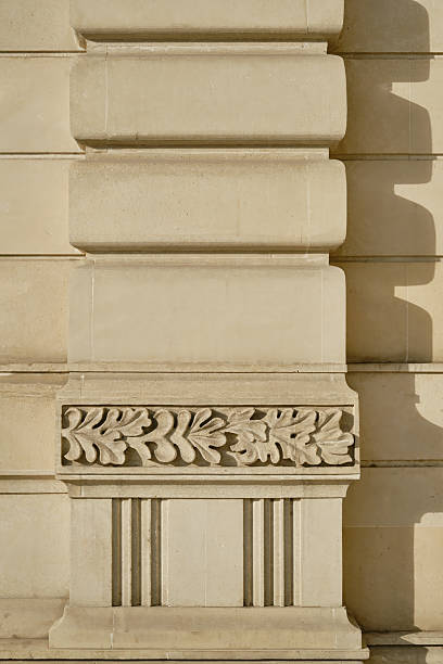 istock Fragment of a marble column with floral pattern. 2201972855