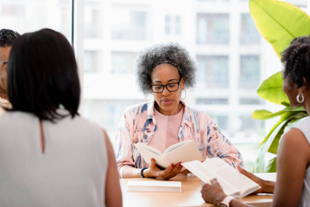 istock Diverse Group of Women Engaging in Book Discussion 2201973542