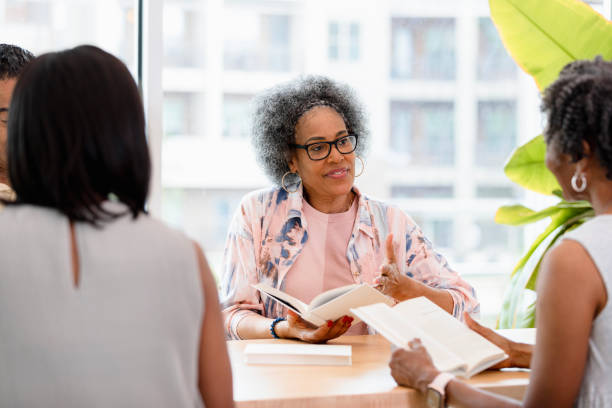 istock Group Therapy Session: Women Discussing Mental Health 2201973546