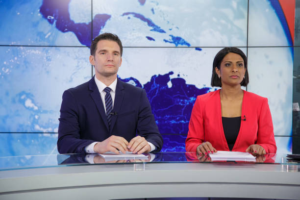 istock Journalists preparing in a tv news studio 2201973898