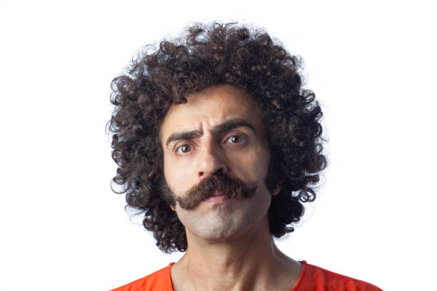 istock Portrait of suspicious man making a face 2201975868