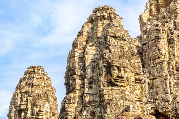 istock Ancient Bayon temple with carved smiling stone faces, Angkor Thom, Siem Reap, Cambodia 2201976436